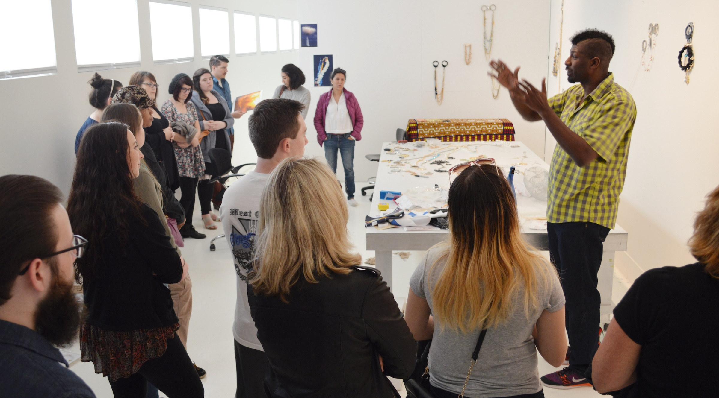 Artist Kambui Olujimi talks to high school students who are spending the day at the Rauschenberg Residency meeting the artists in residence and learning firsthand about “Life as an Artist!”