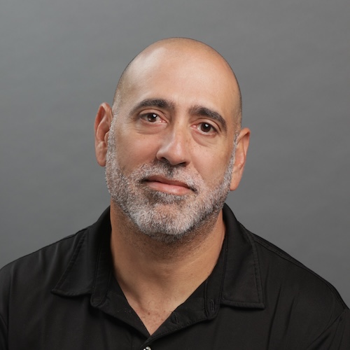Photo of a man in a black shirt