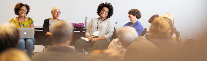 Conference attendees smiling