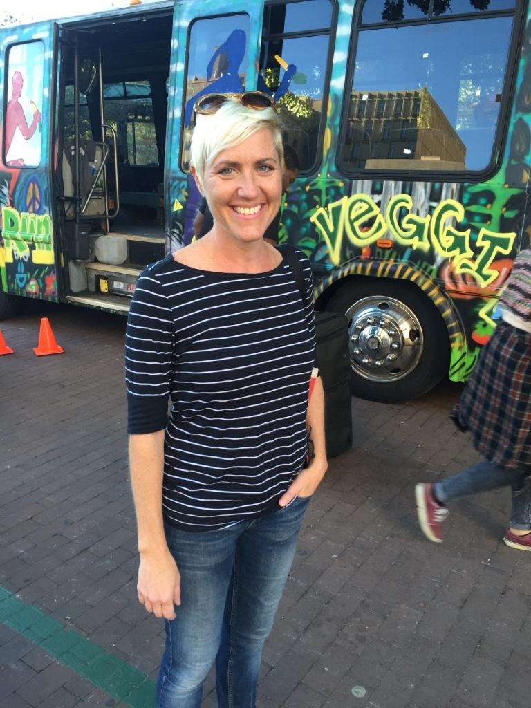 A person standing in front of a bus

AI-generated content may be incorrect.