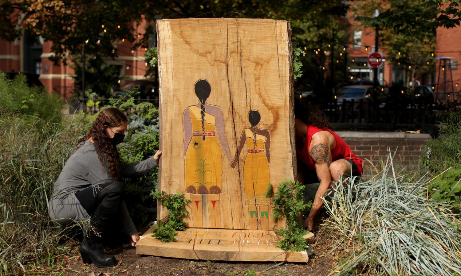 Artists install a public work during their residency.