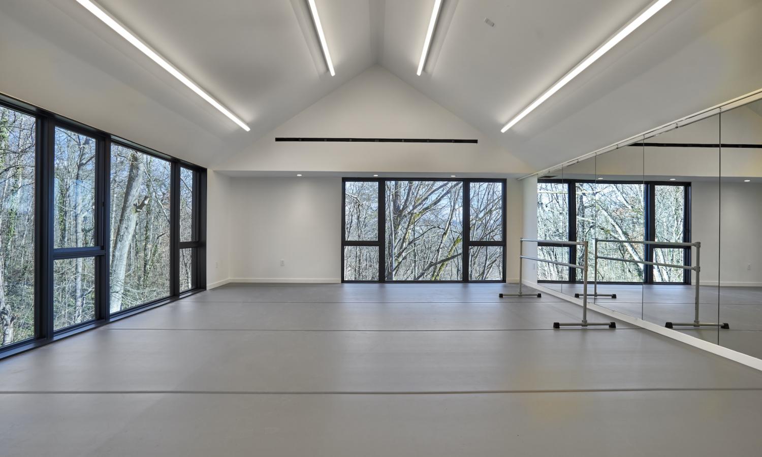Interior of Performing Arts Studio showing mirrors and dance bar