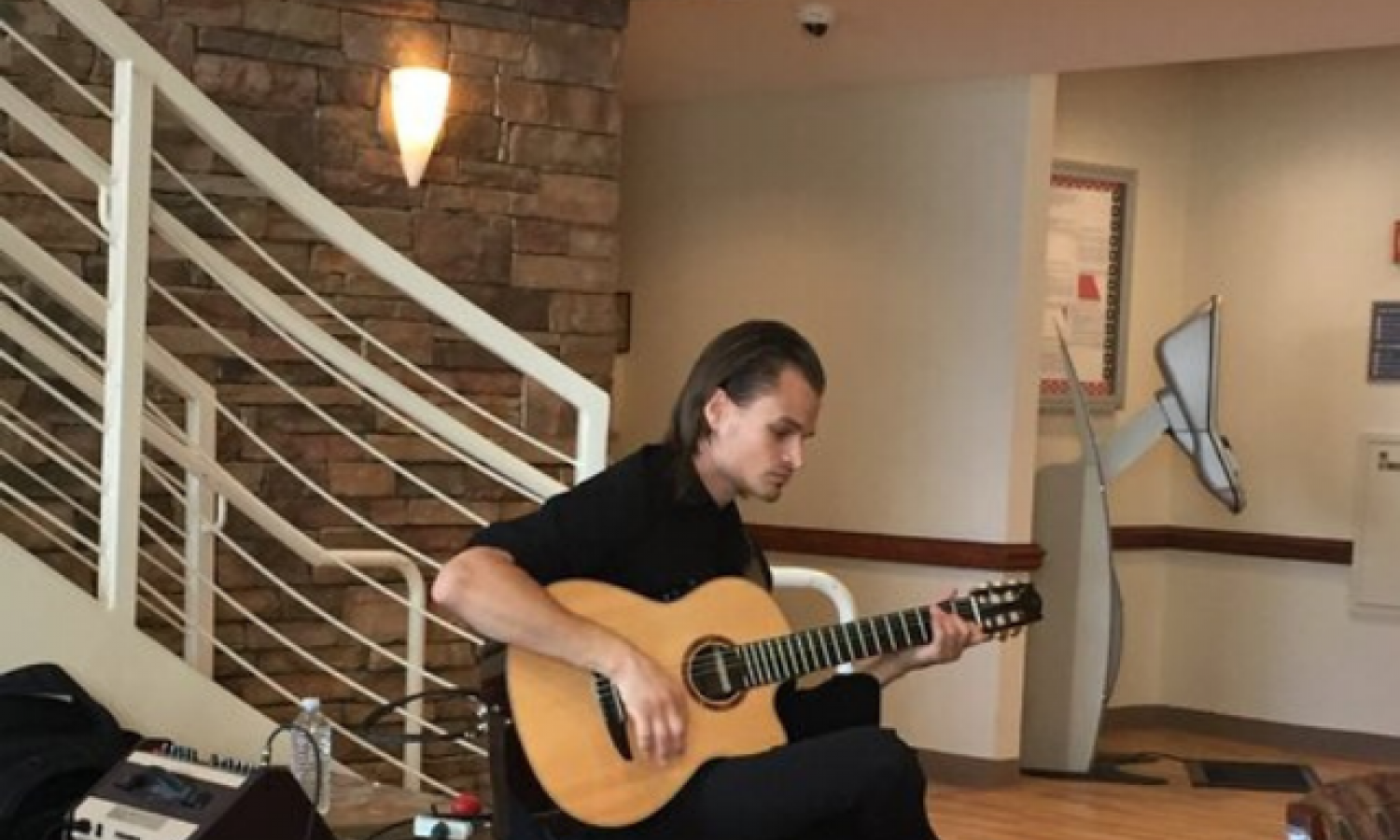 Gladius, SFI alum, performs in Grady Hospital.