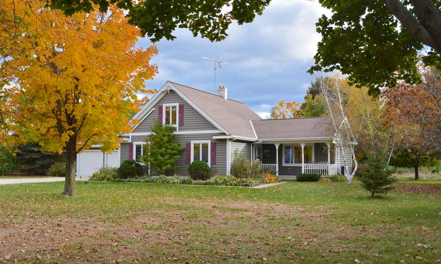 Front of the residency house in fall.