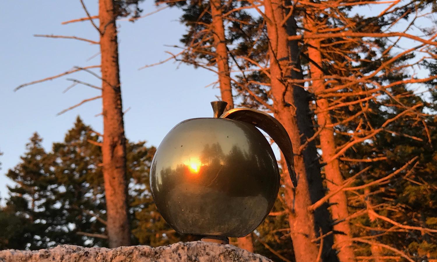Golden Apple on granite marker at Golden Apple Art Residency