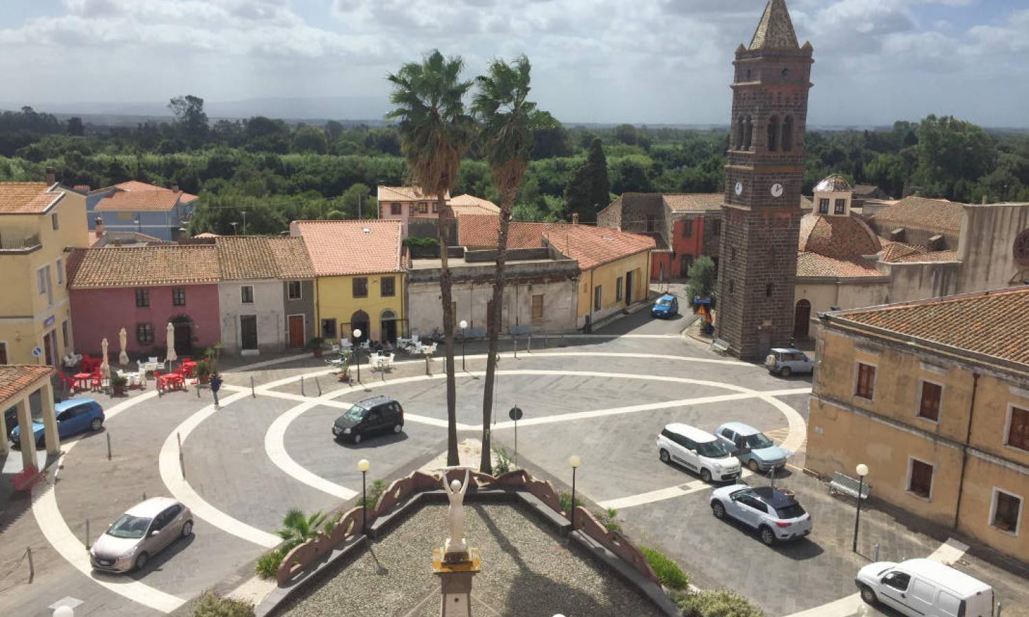 The current location is in the rural medieval village of Milis - main square