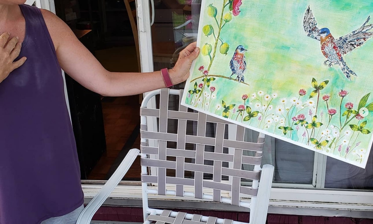 Danielle Egan shows work on the back porch of Raspberry Residency House.