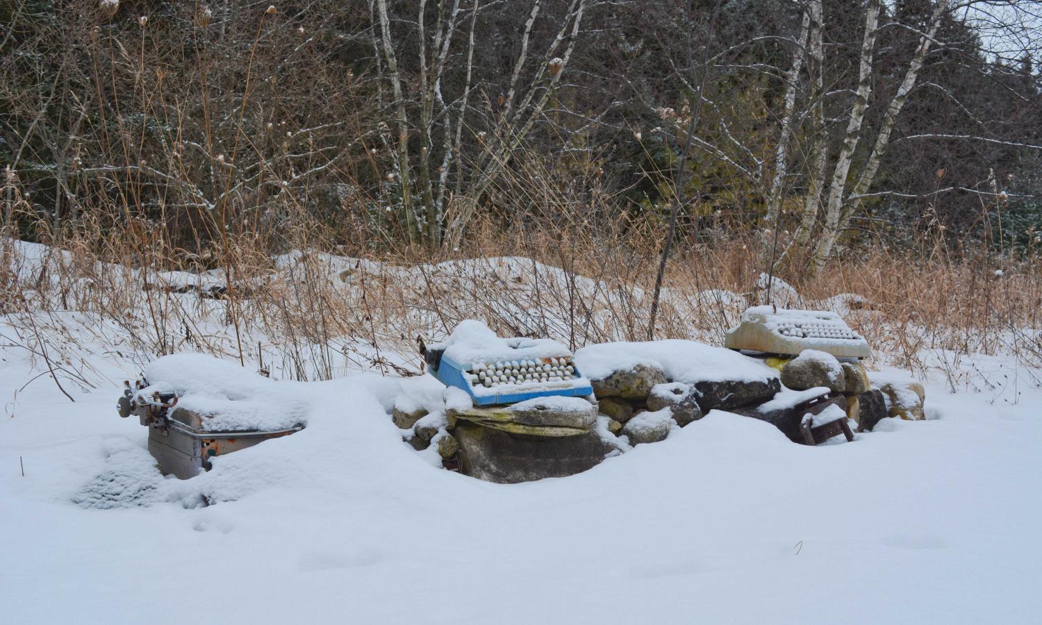 Snowfall on the typewriters outside The Coop.