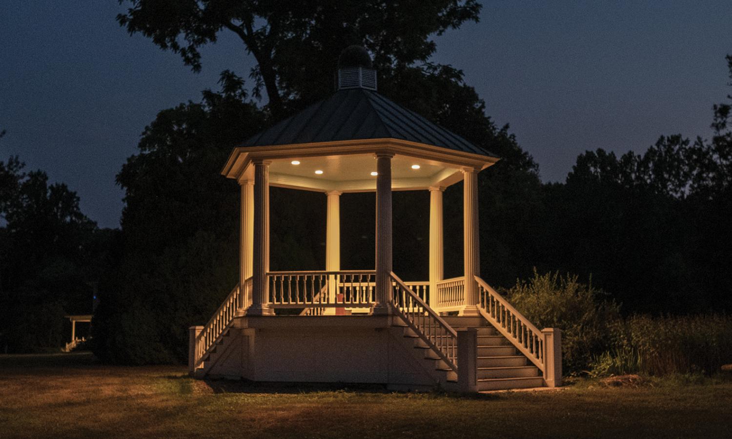 The VCCA gazebo lit up at night