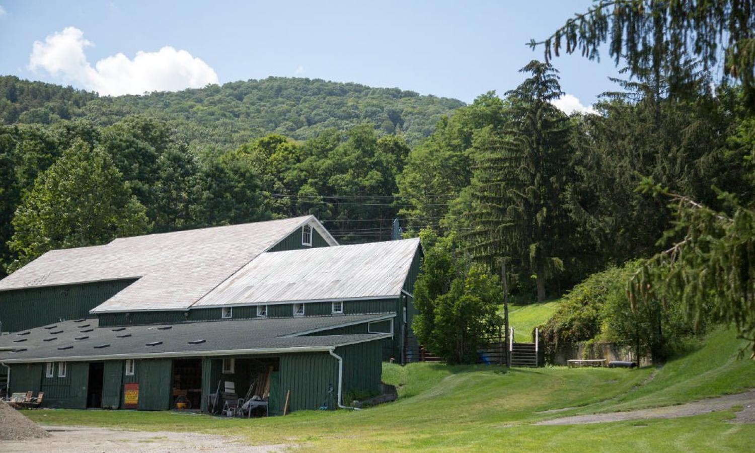 Luther Barn: former livestock barn, which houses our summer artist studios, seasonal Print shop, and Wood shop