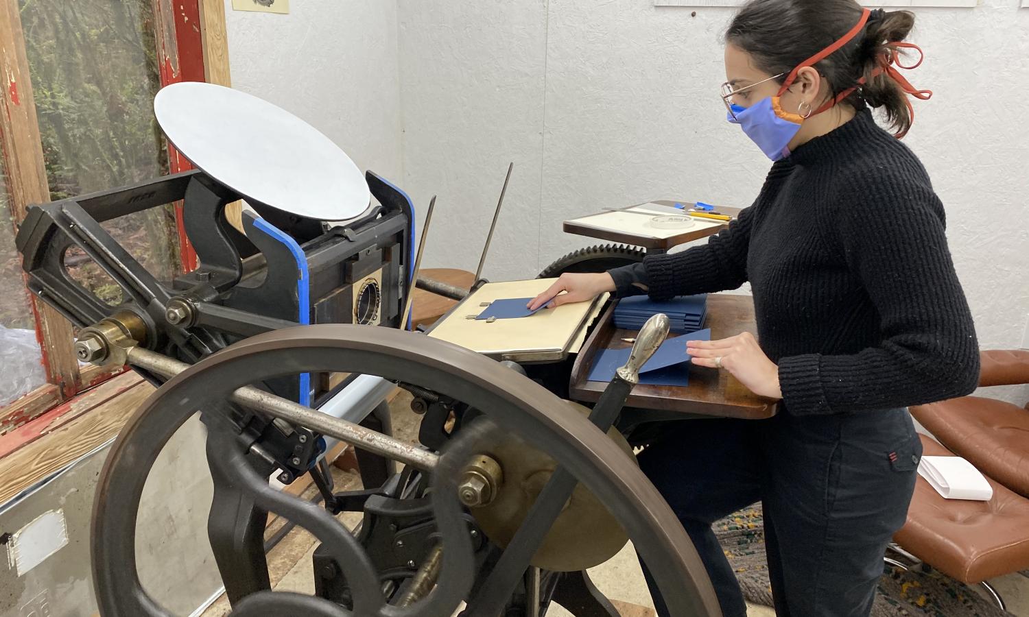 Print resident Alejandra Arias Sevilla makes a letterpress print
