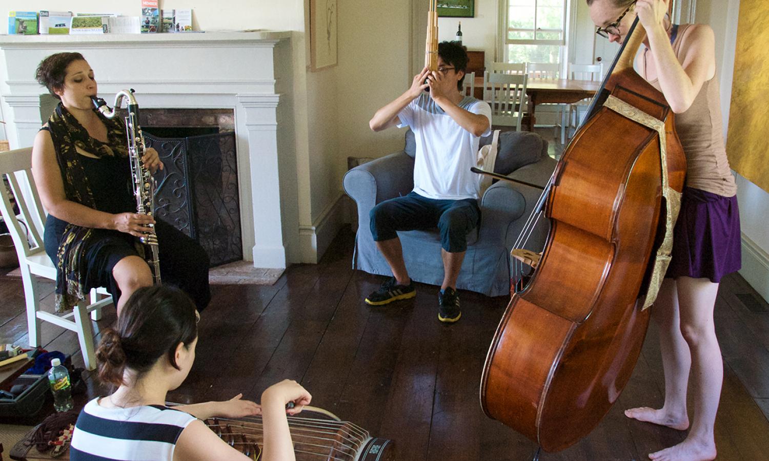 Music residents performing in Ledig house dining room