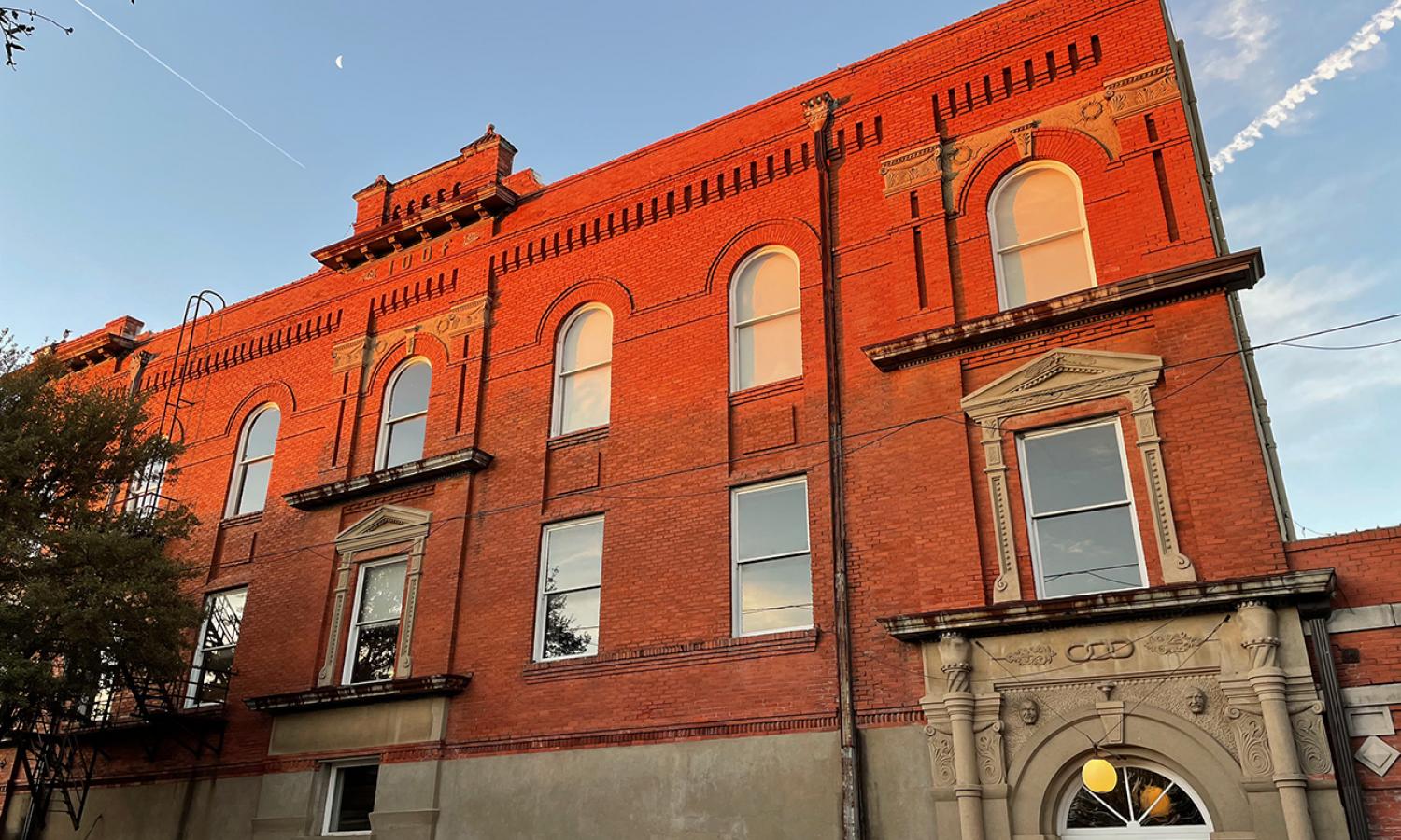 East facade of 100W residency building. 2 artists and 1 writer hosted simultaneously on the 2nd and 3rd floors.