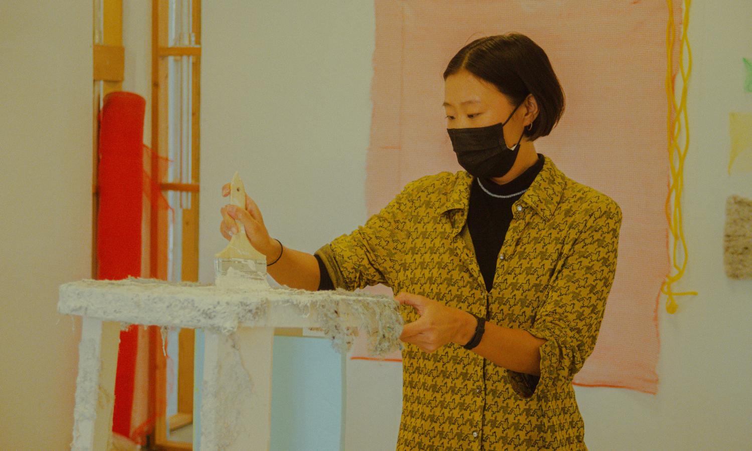 Artist at work at the Arts Center at Governors Island