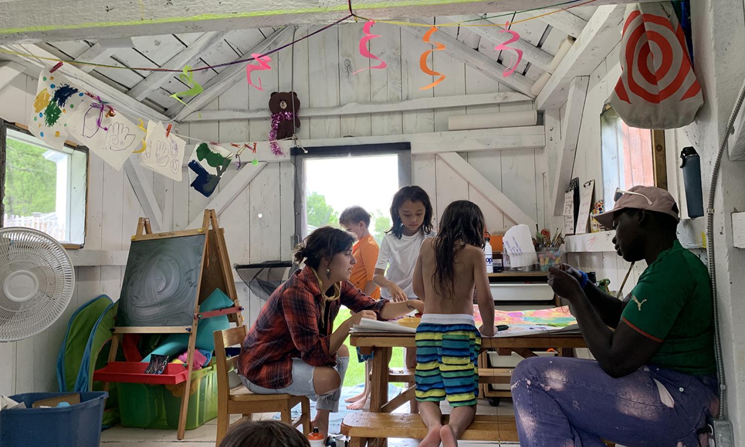 In the Kid's Studio Barn during the Family Residency, with Artist and Coordinator Kristy Hughes and Educator Afua Sarfo.