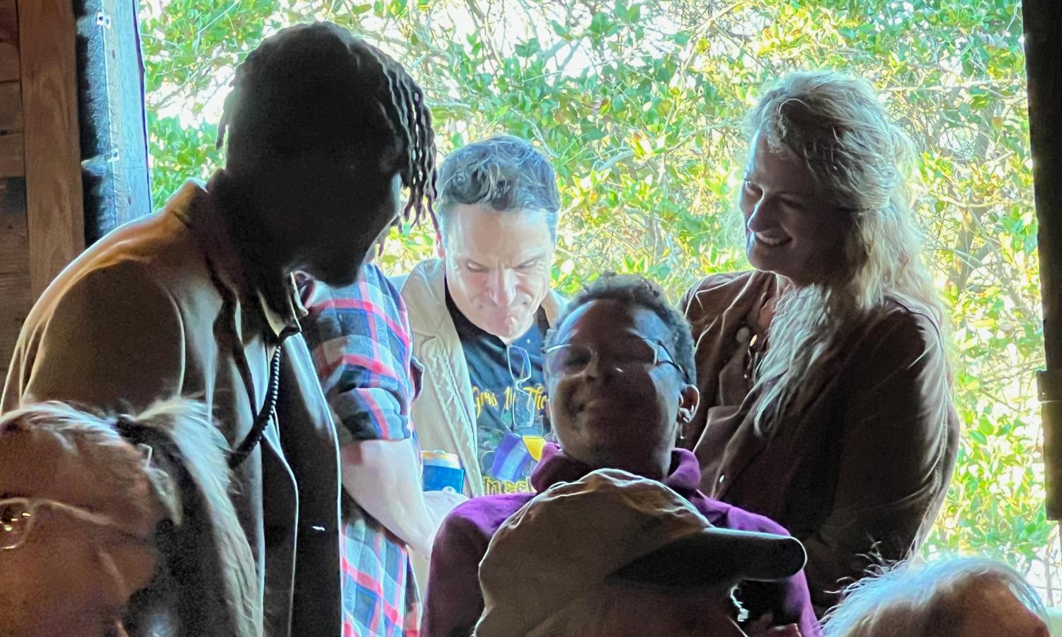 Creative culture-loving folks socializing on the ramp landing for The Whirlybird