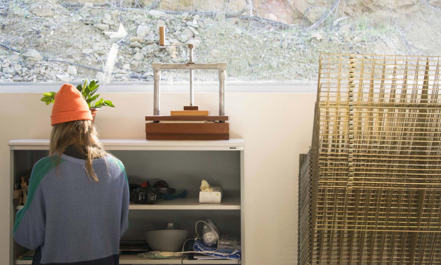 Organizing squeegees next to the drying rack
