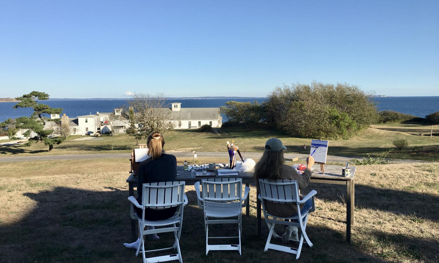 Artists painting on the Avalon lawn