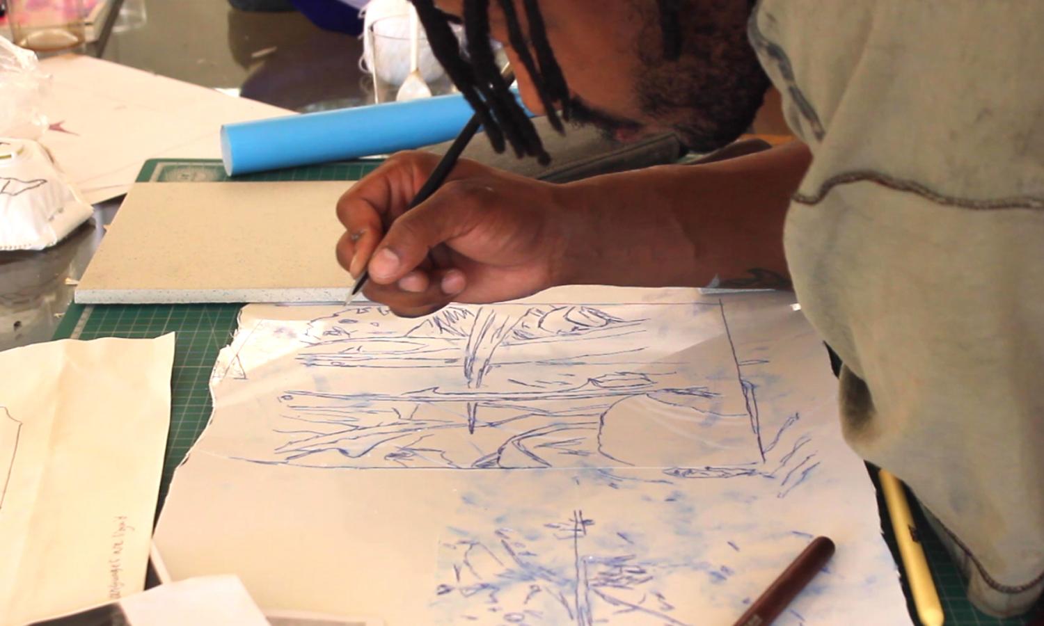 Artist doing preparatory drawings