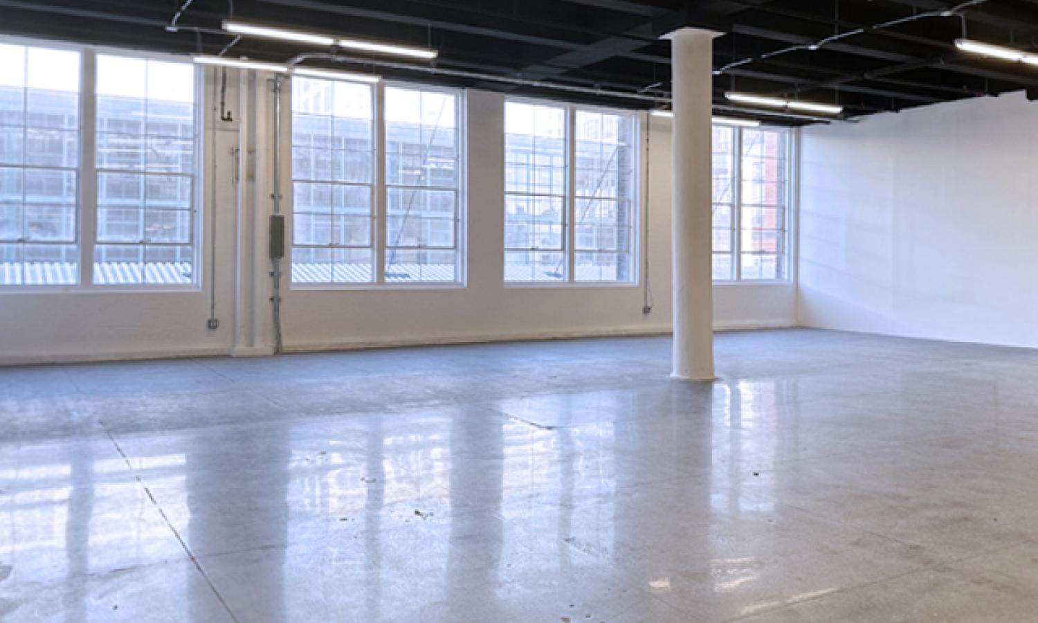 side view of studio with windows, pillar, walls