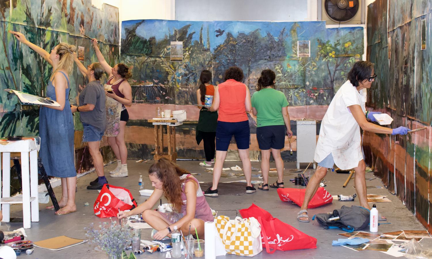 Students working on collaborative mural.