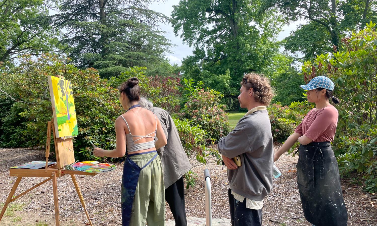 Students painting in Westbury Gardens, with Graham Nickson.