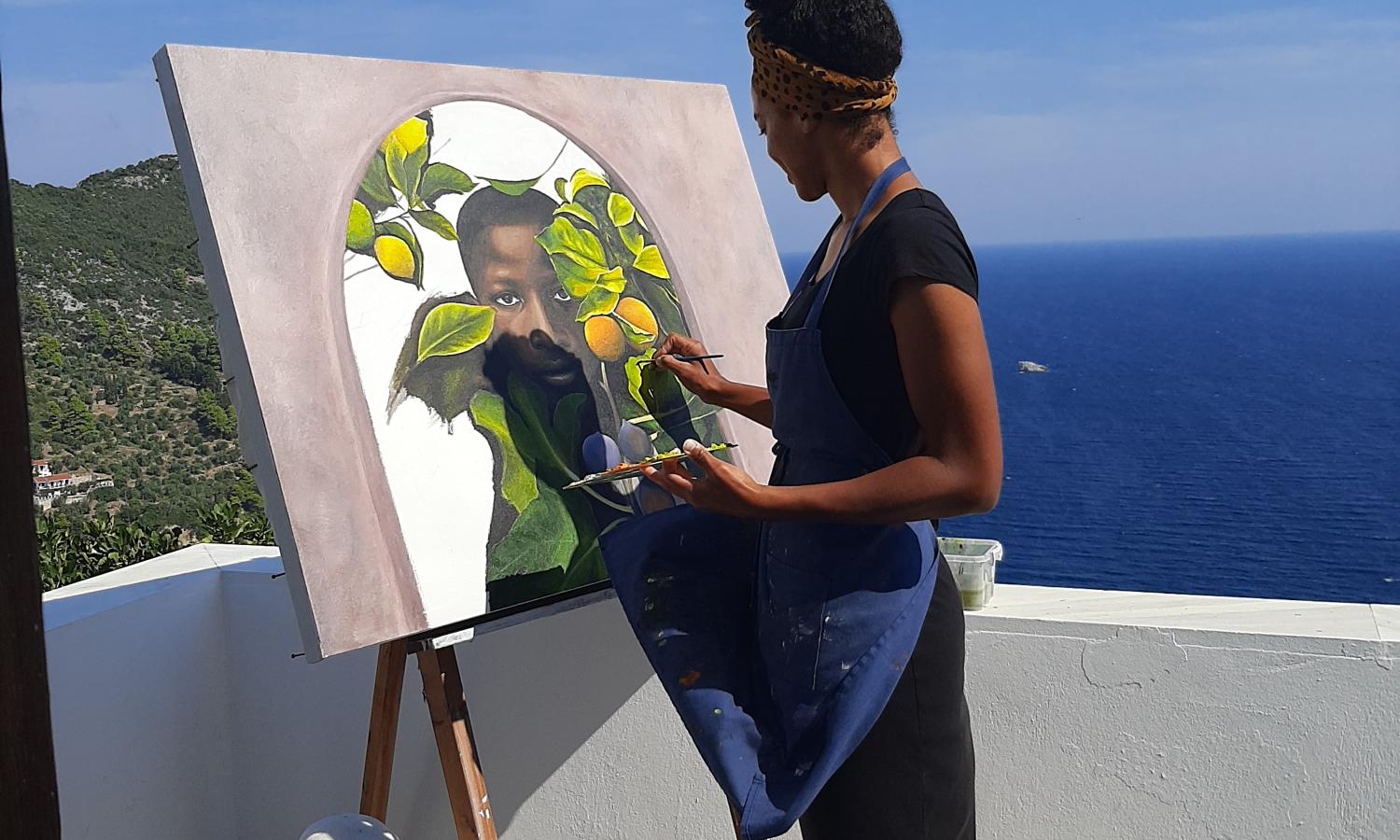 Resident Painter on one of the SkopArt Balconies