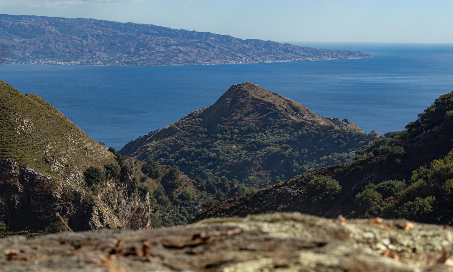 The view from the village of Pezzolo looking out across the mountains towards the Strait of Messina and Calabria. Photo by Peppe Spuria.