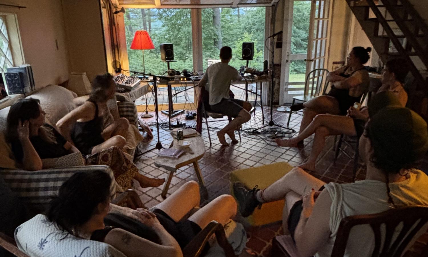 Residents gather for the weekly cabin share