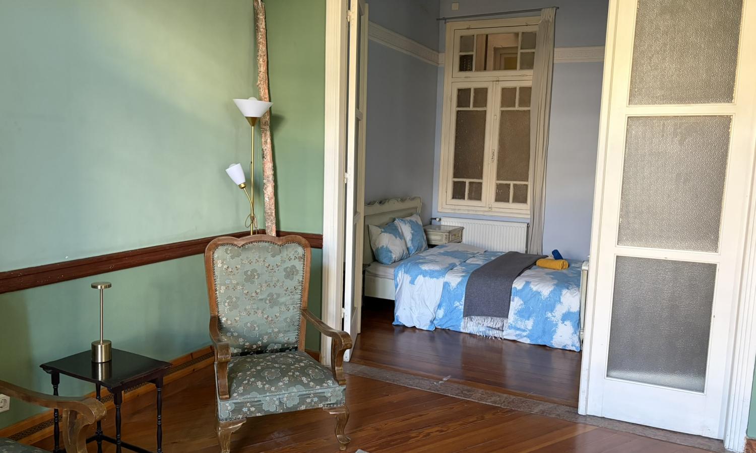 The living room and one bedroom in the accommodation