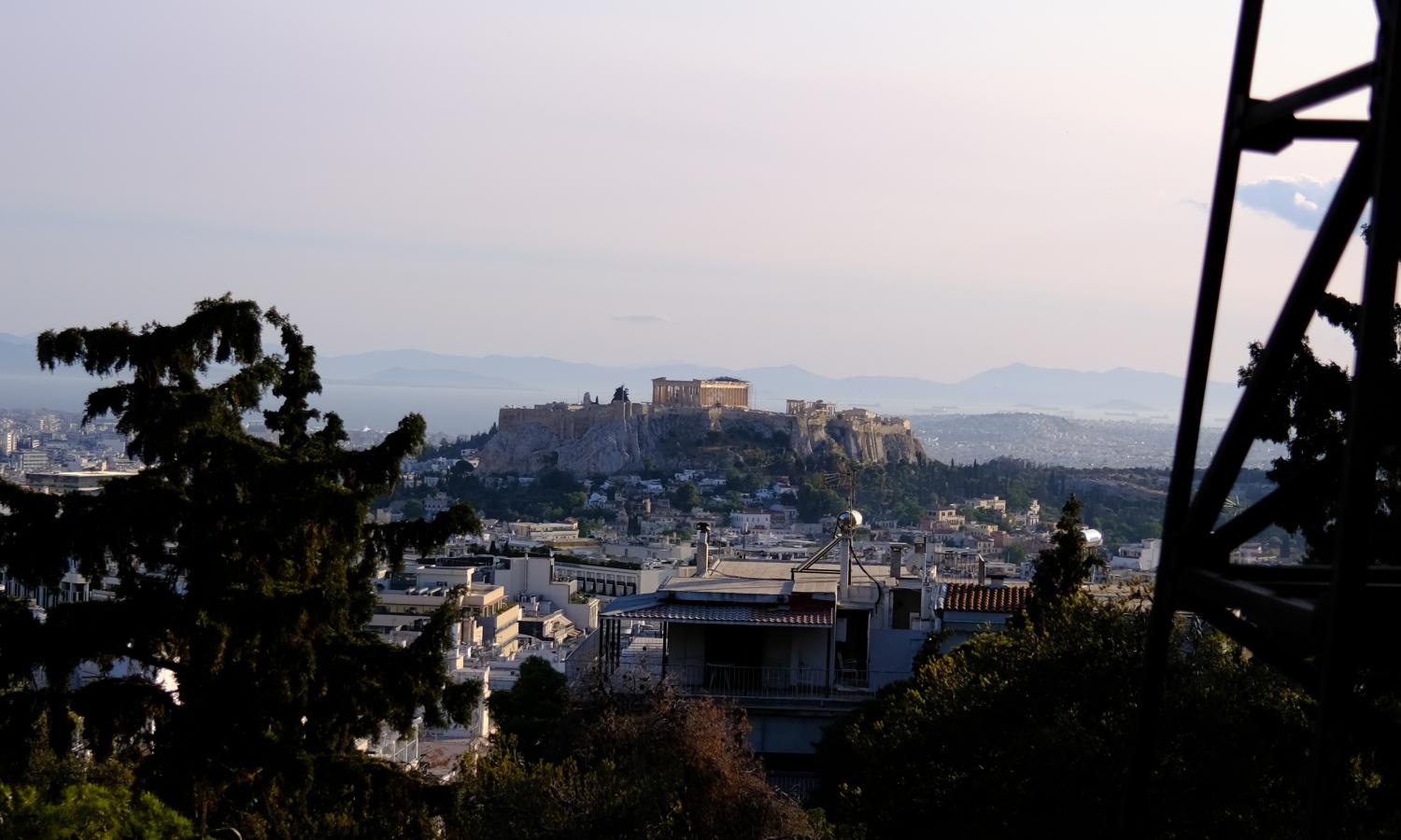 A twilight view of the Acropolis from a viewpoint across from the studios.