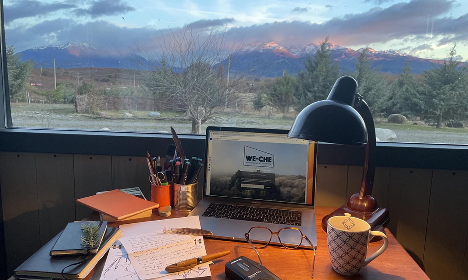 We-Che private Tiny-Studio 3, desk with a mountain view, winter sunset