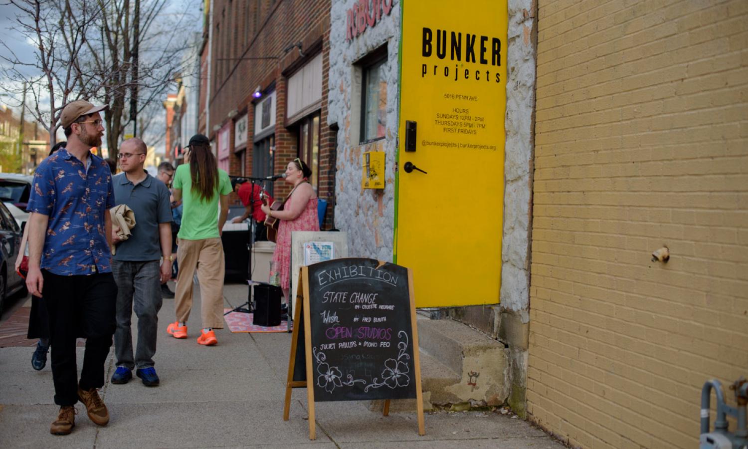 Our bright yellow door is open for First Friday Gallery Crawls in the busy Penn Avenue arts district