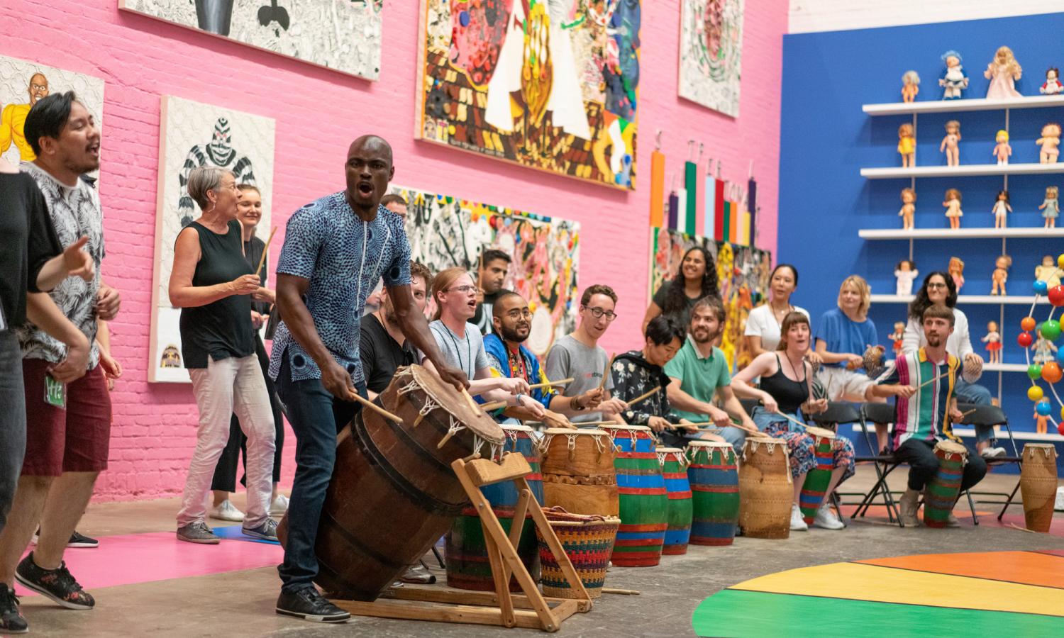Ghanaian drumming performance in the gallery