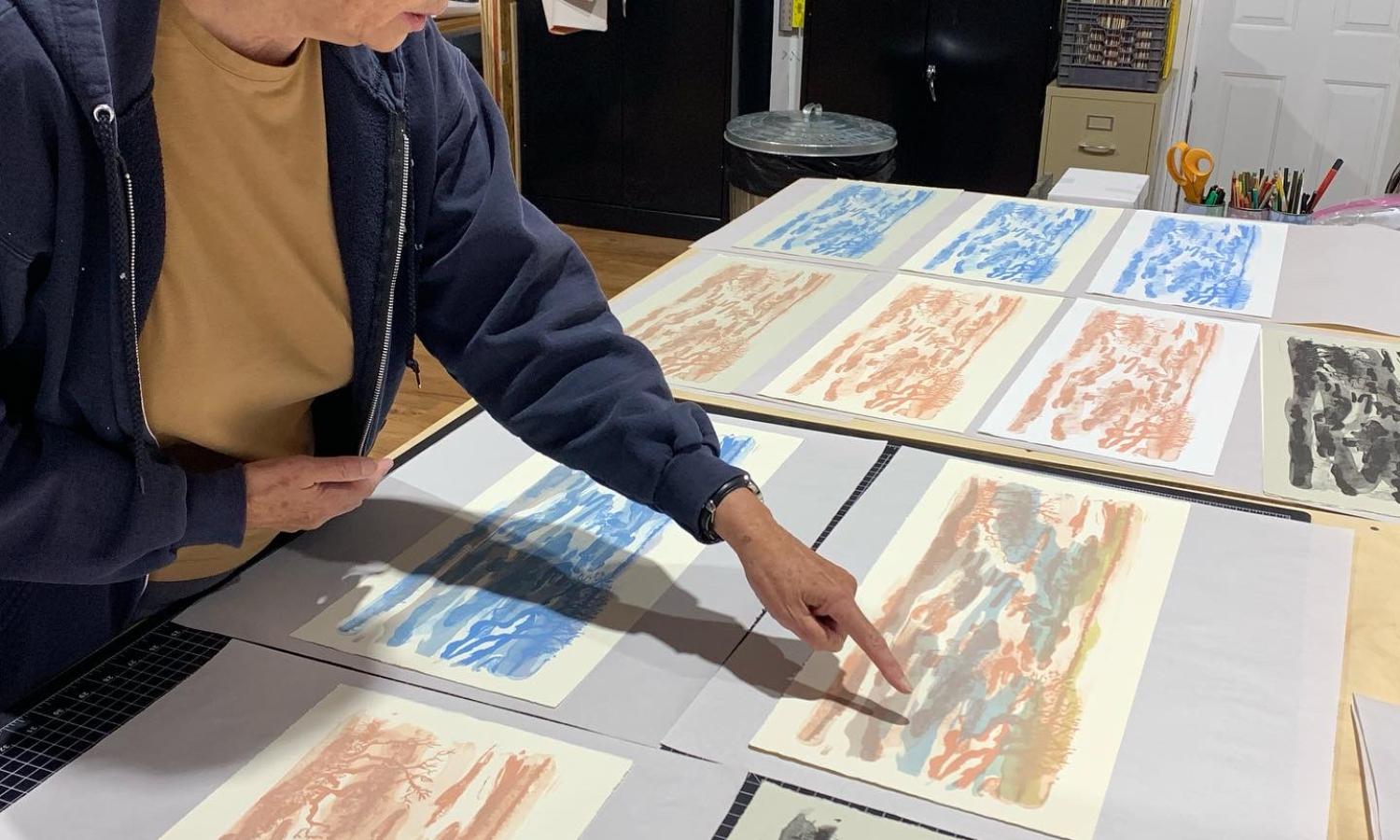 Resident artist, Jean McClaughlin, looking at proofs at Obee Editions