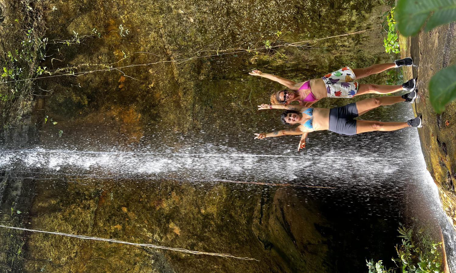 artist at waterfall