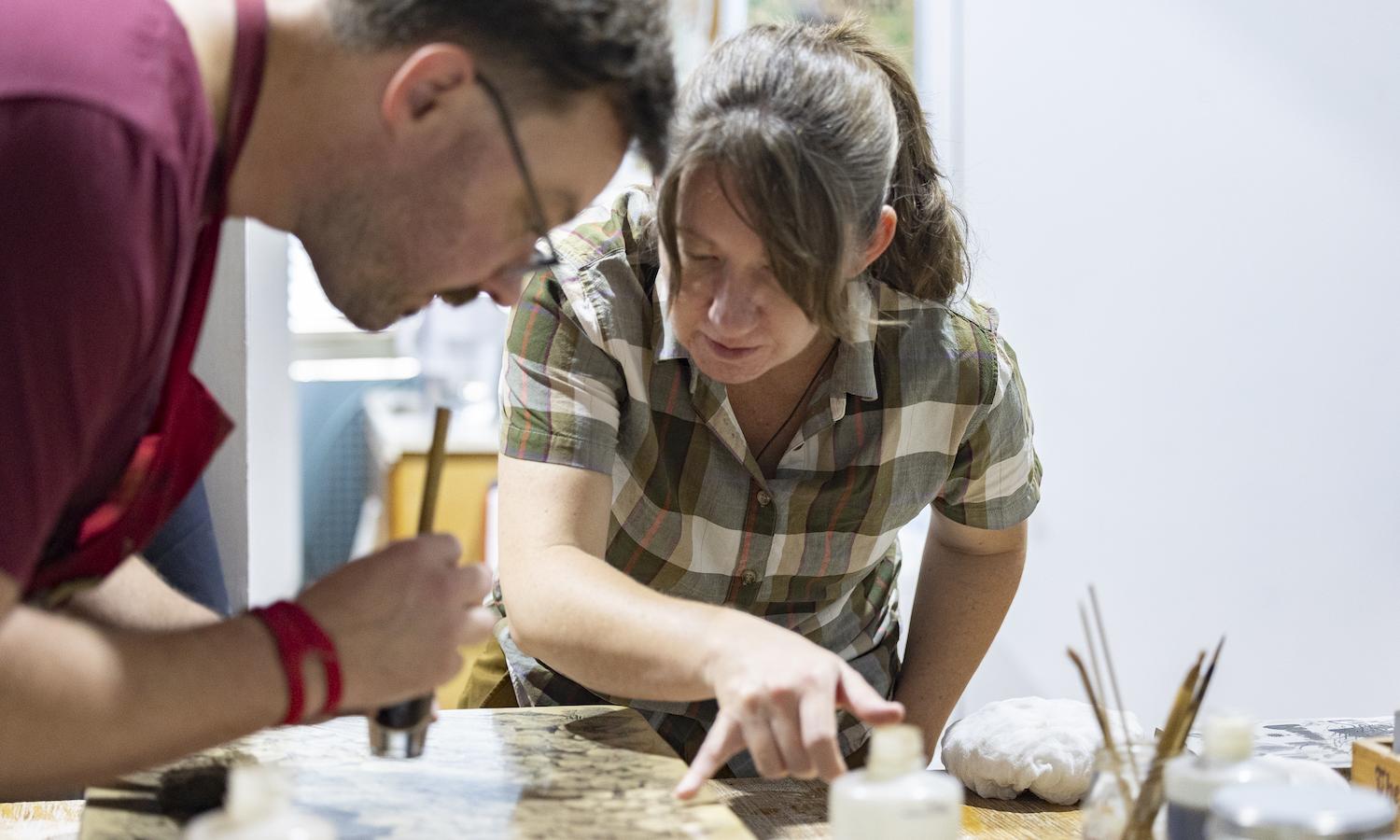 Resident artist, Cedra Wood, working with Master Printer, Perry Obee