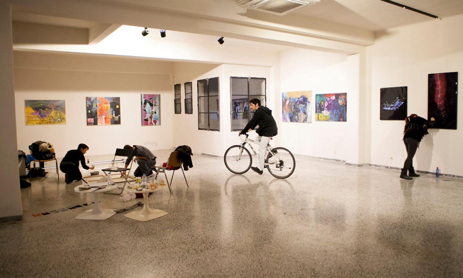 A person riding a bicycle in our exhibition space.